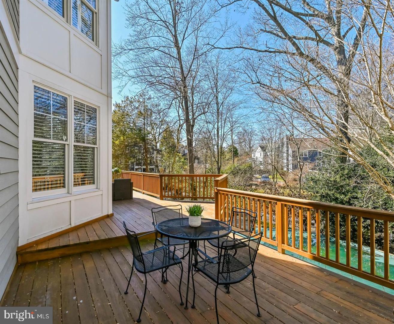 6516 76th Place Cabin John, MD 20818 - Photo 20 of 46 a view of a chairs and table on the wooden floor