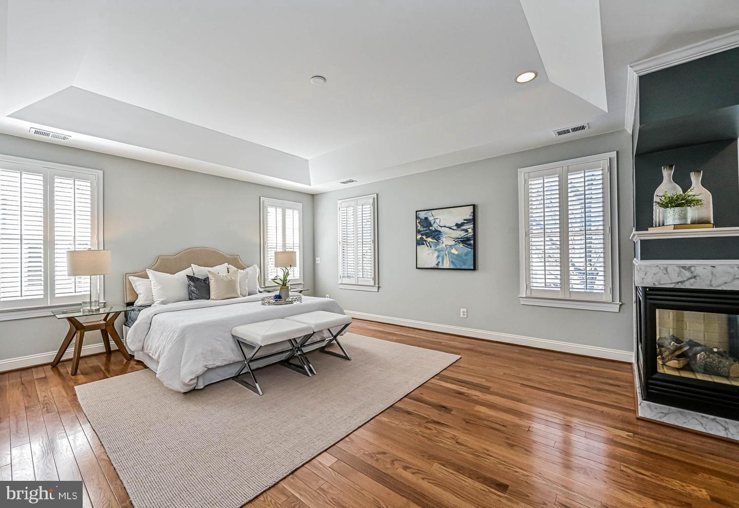 6516 76th Place Cabin John, MD 20818 - Photo 22 of 46 a bed room with bed and a fireplace