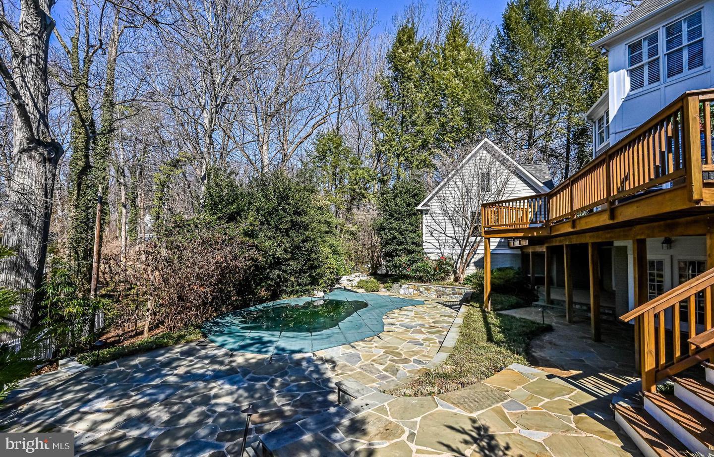 6516 76th Place Cabin John, MD 20818 - Photo 44 of 46 a view of a house with a yard