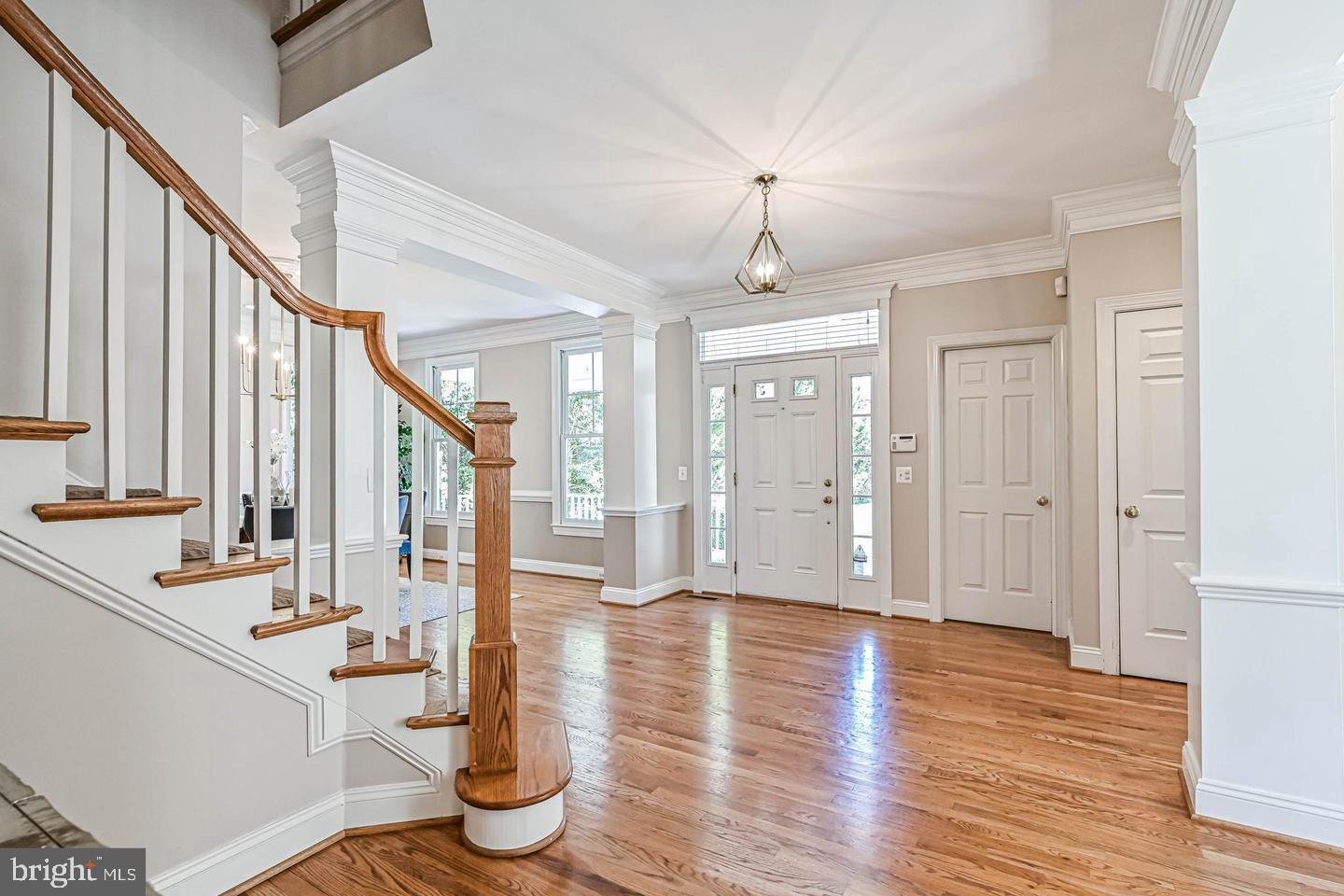 6516 76th Place Cabin John, MD 20818 - Photo 5 of 46 a view of an entryway with wooden floor and door