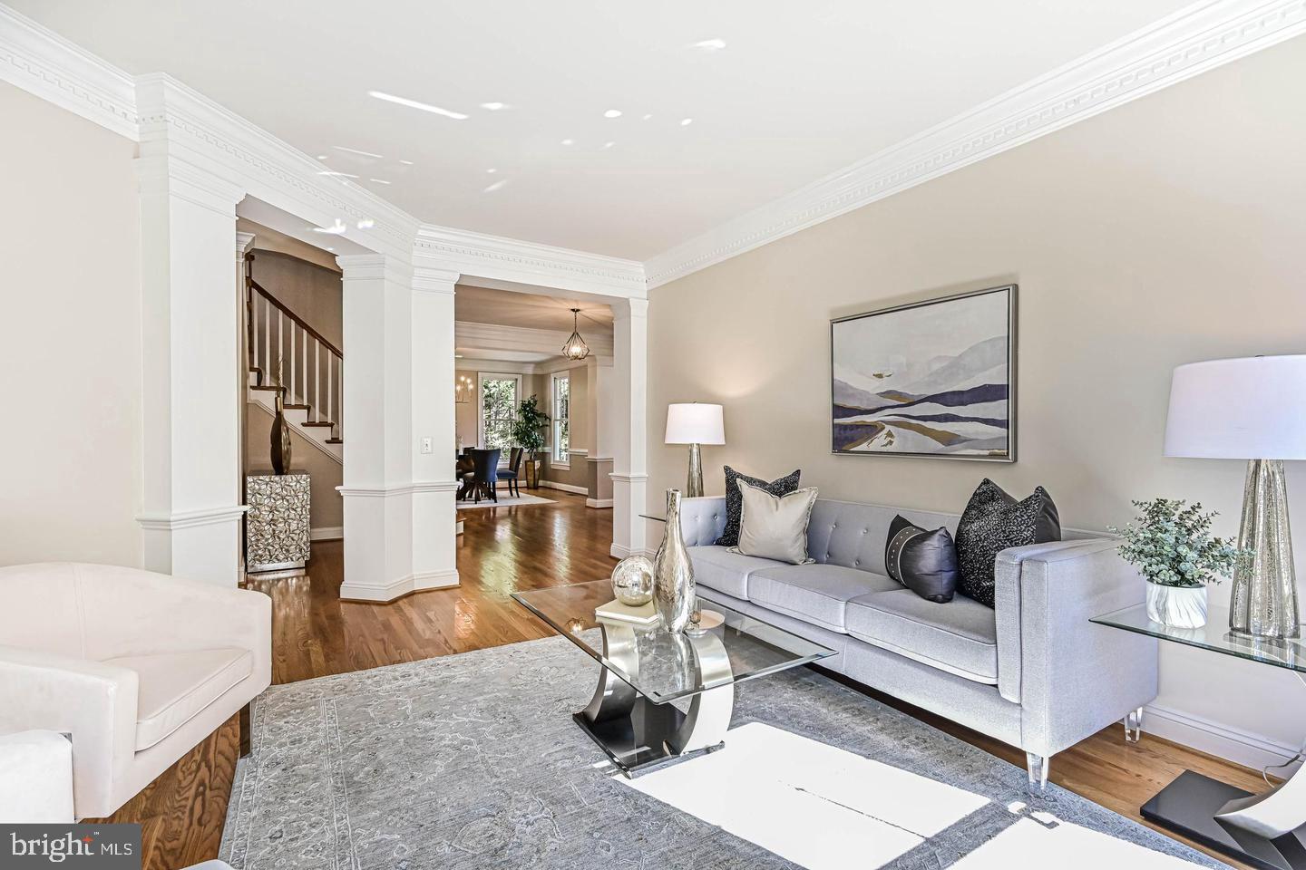 6516 76th Place Cabin John, MD 20818 - Photo 9 of 46 a living room with furniture and wooden floor