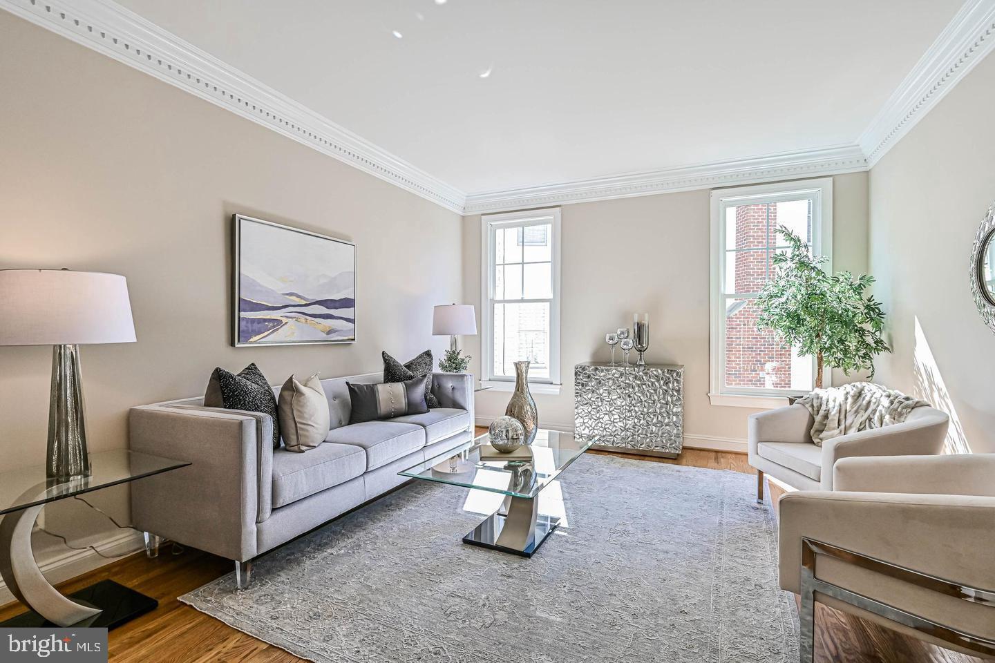 6516 76th Place Cabin John, MD 20818 - Photo 10 of 46 a living room with furniture and a large window