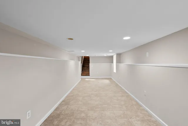 a view of a house with patio and a yard