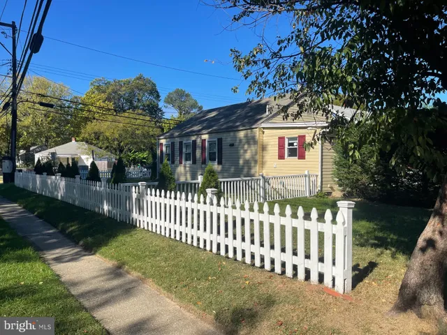 a view of a wooden fence