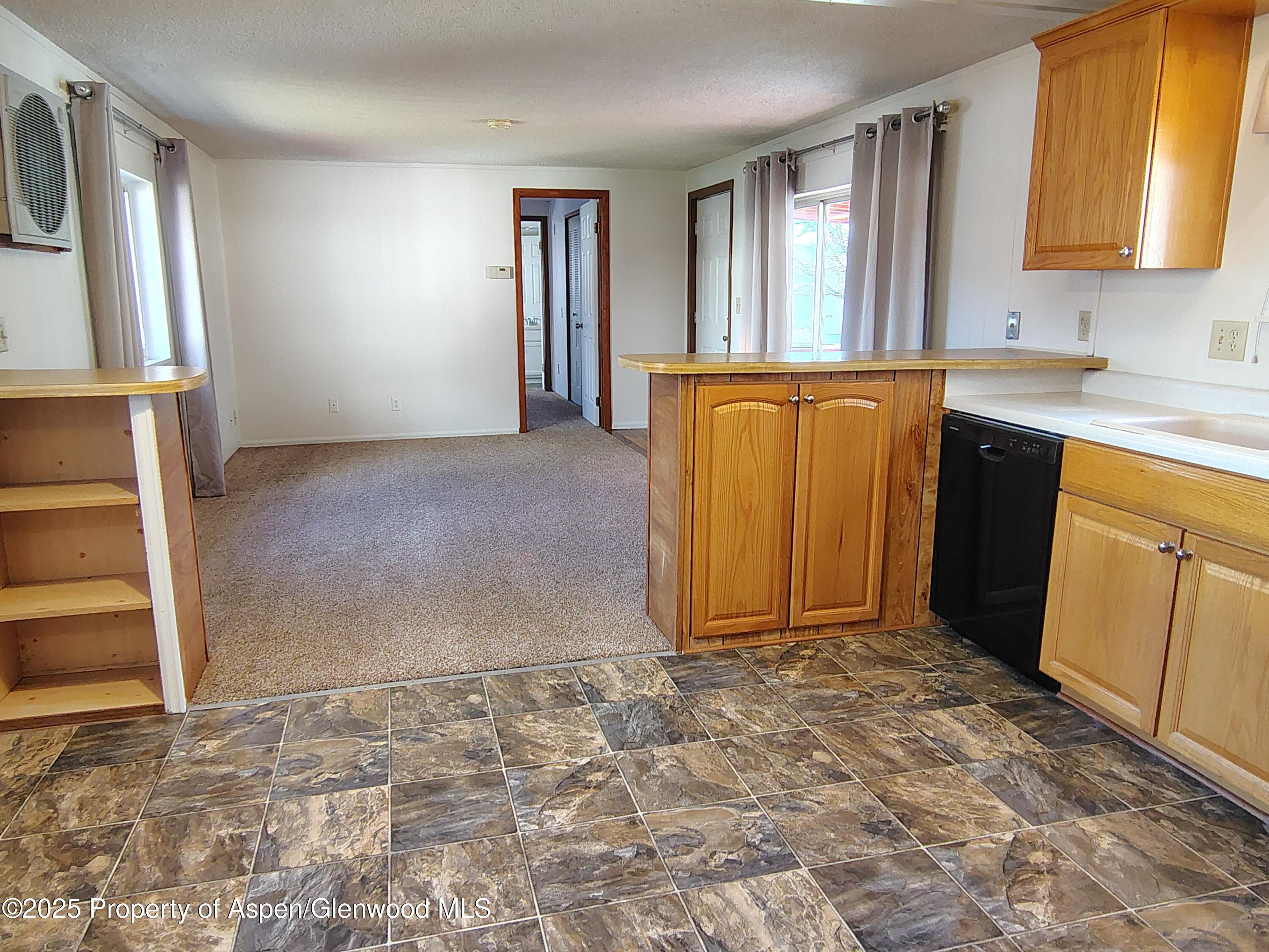 8 St John Circle Parachute, CO 81635 - Photo 15 of 32 a view of a utility room with closet and a window