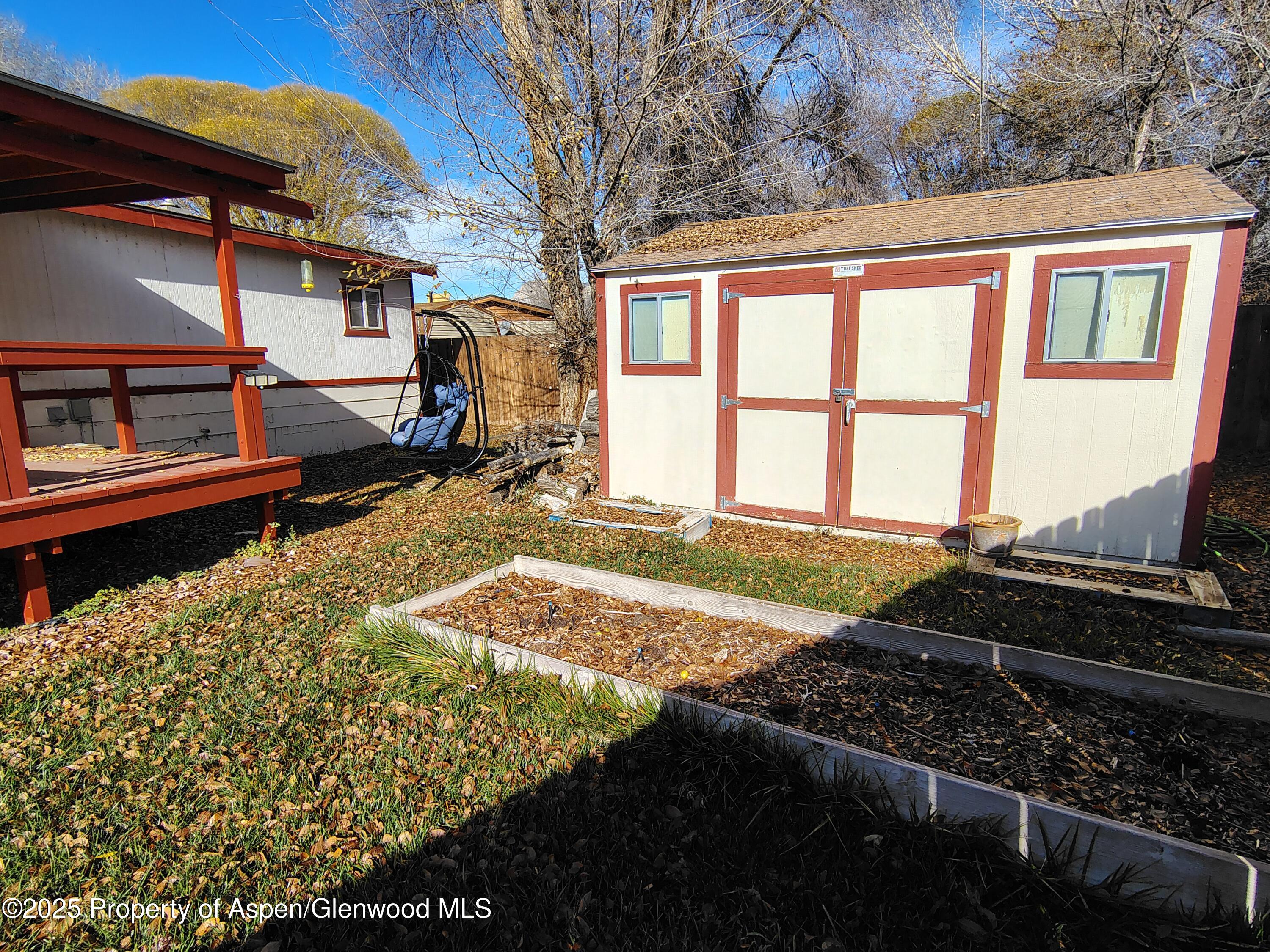 8 St John Circle Parachute, CO 81635 - Photo 31 of 32 a view of a backyard of a house