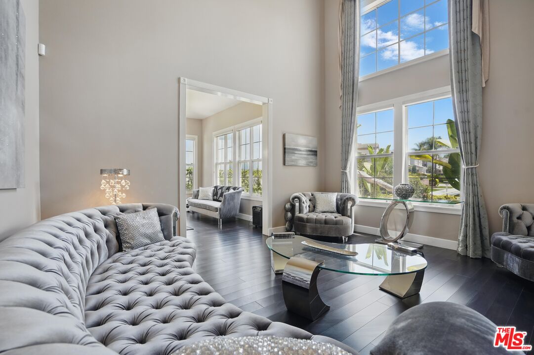 4040 Leighton Point Road Calabasas, CA 91301 - Photo 11 of 47 a living room with furniture and a large window