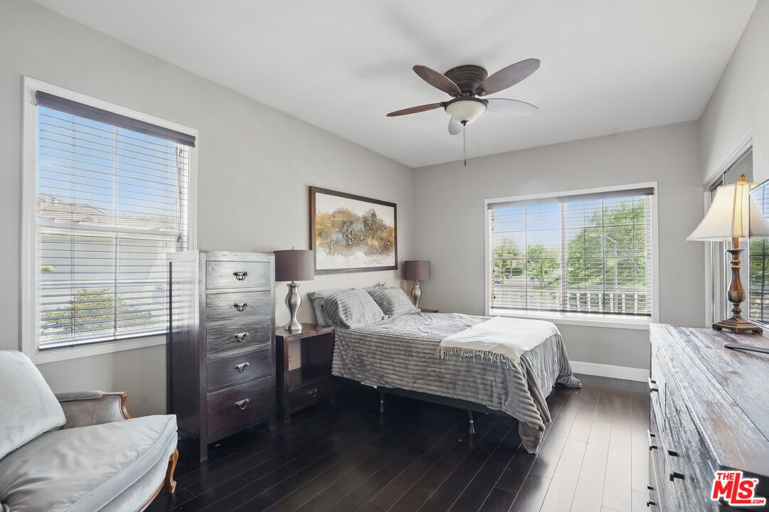 4040 Leighton Point Road Calabasas, CA 91301 - Photo 38 of 47 a bedroom with a bed and a couch