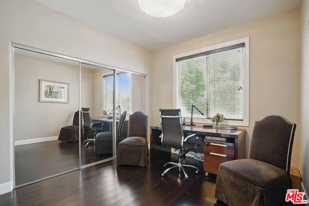4040 Leighton Point Road Calabasas, CA 91301 - Photo 44 of 47 a view of a livingroom with workspace and furniture