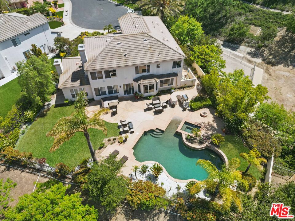 4040 Leighton Point Road Calabasas, CA 91301 - Photo 45 of 47 an aerial view of a house with yard swimming pool and outdoor seating