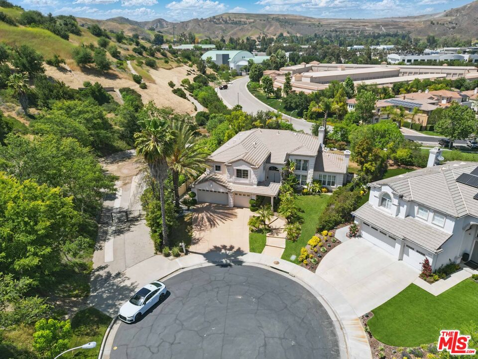 4040 Leighton Point Road Calabasas, CA 91301 - Photo 46 of 47 an aerial view of a house with a garden