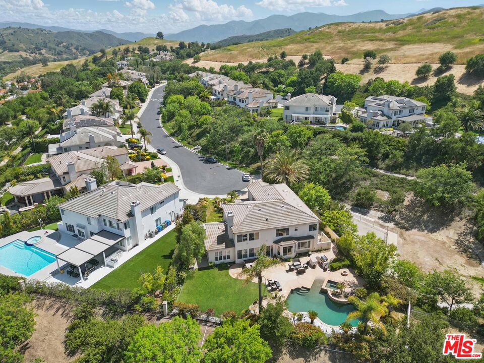 4040 Leighton Point Road Calabasas, CA 91301 - Photo 47 of 47 an aerial view of residential houses with outdoor space