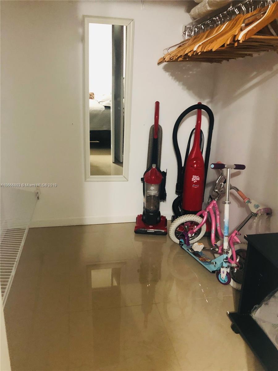17100 North Bay Road, Unit 1212 Sunny Isles Beach, FL 33160 - Photo 23 of 24 a view of a room with gym equipment