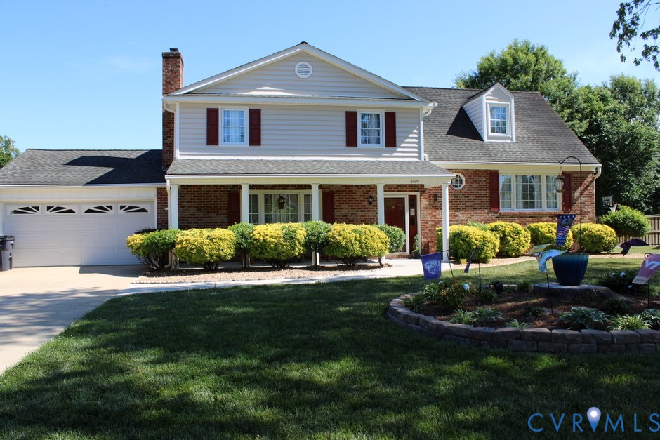 4709 Ridgecrest Lane Colonial Heights, VA 23834 - Photo 3 of 3 a front view of a house with a yard