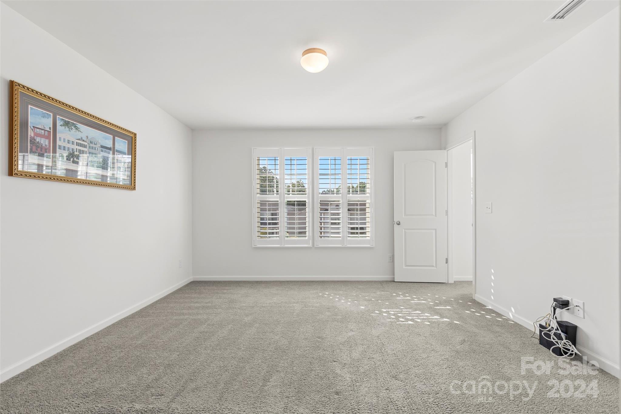 1015 Cherry Bark Place Landis, NC 28088 - Photo 13 of 24 a view of an empty room with a window