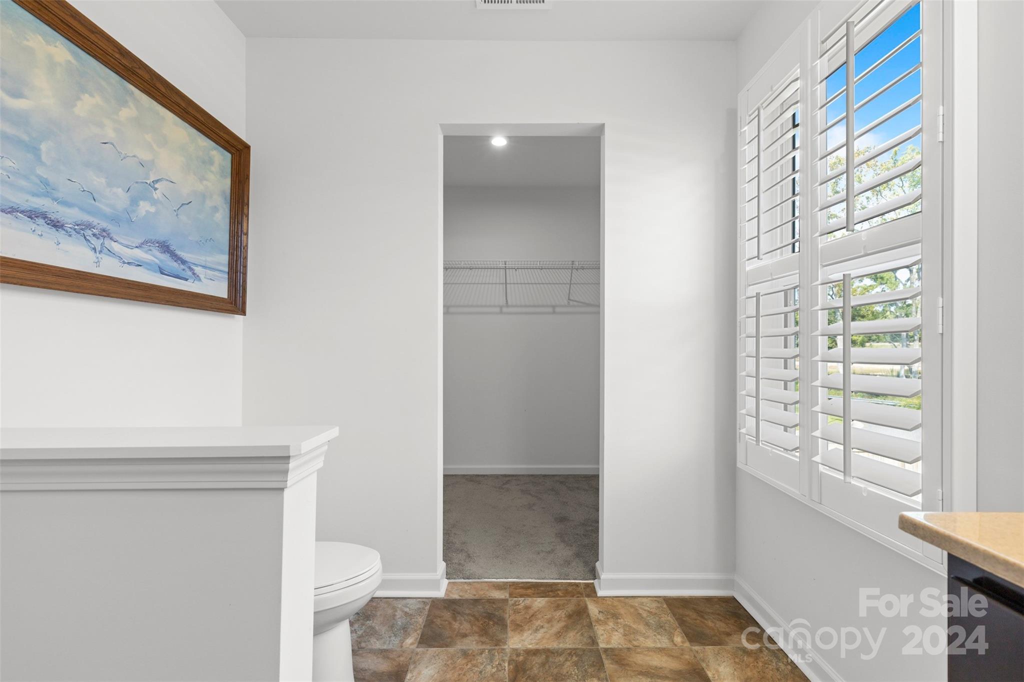 1015 Cherry Bark Place Landis, NC 28088 - Photo 17 of 24 a bathroom with a toilet and a shower