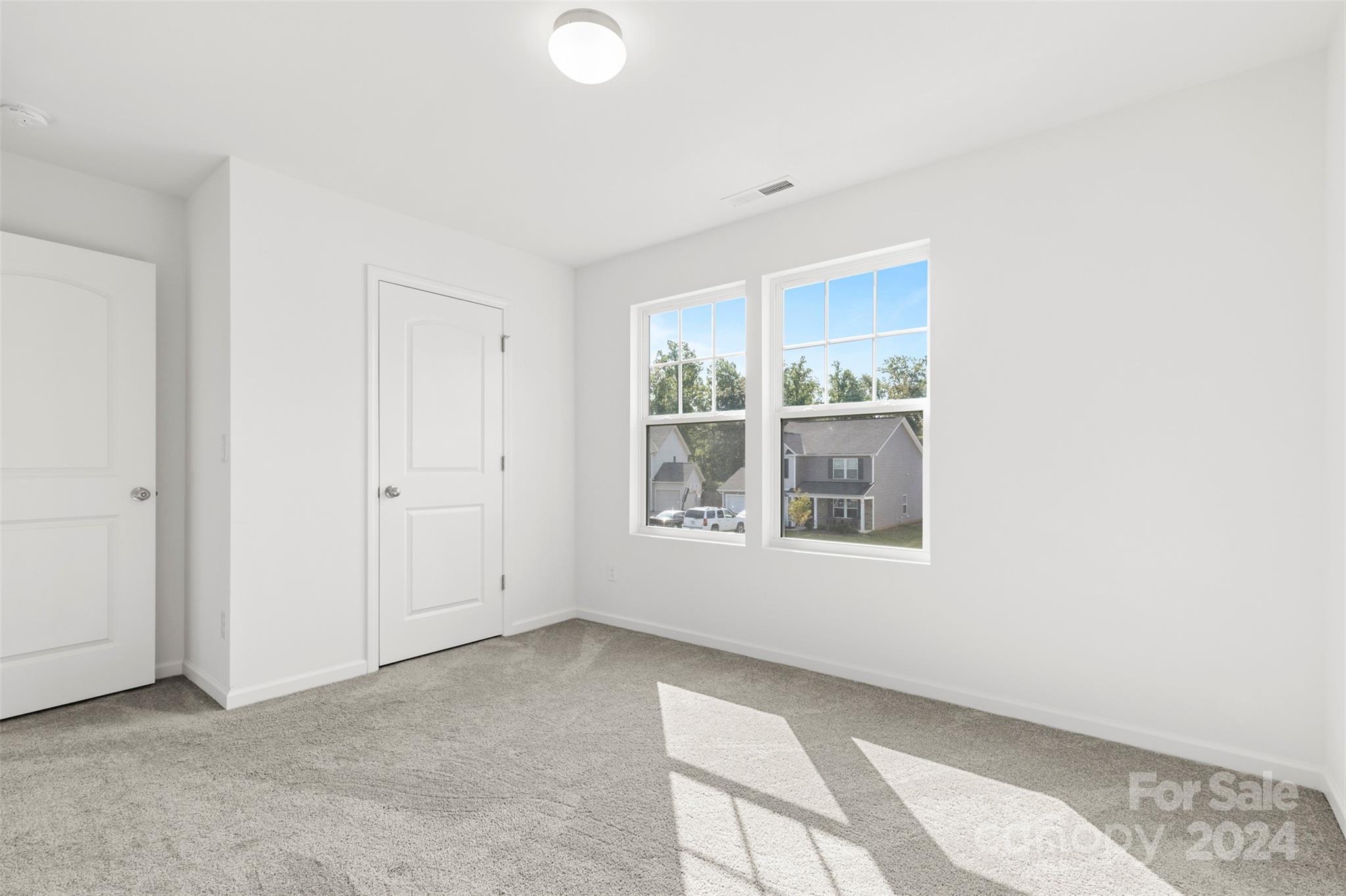 1015 Cherry Bark Place Landis, NC 28088 - Photo 20 of 24 a view of an empty room with a window