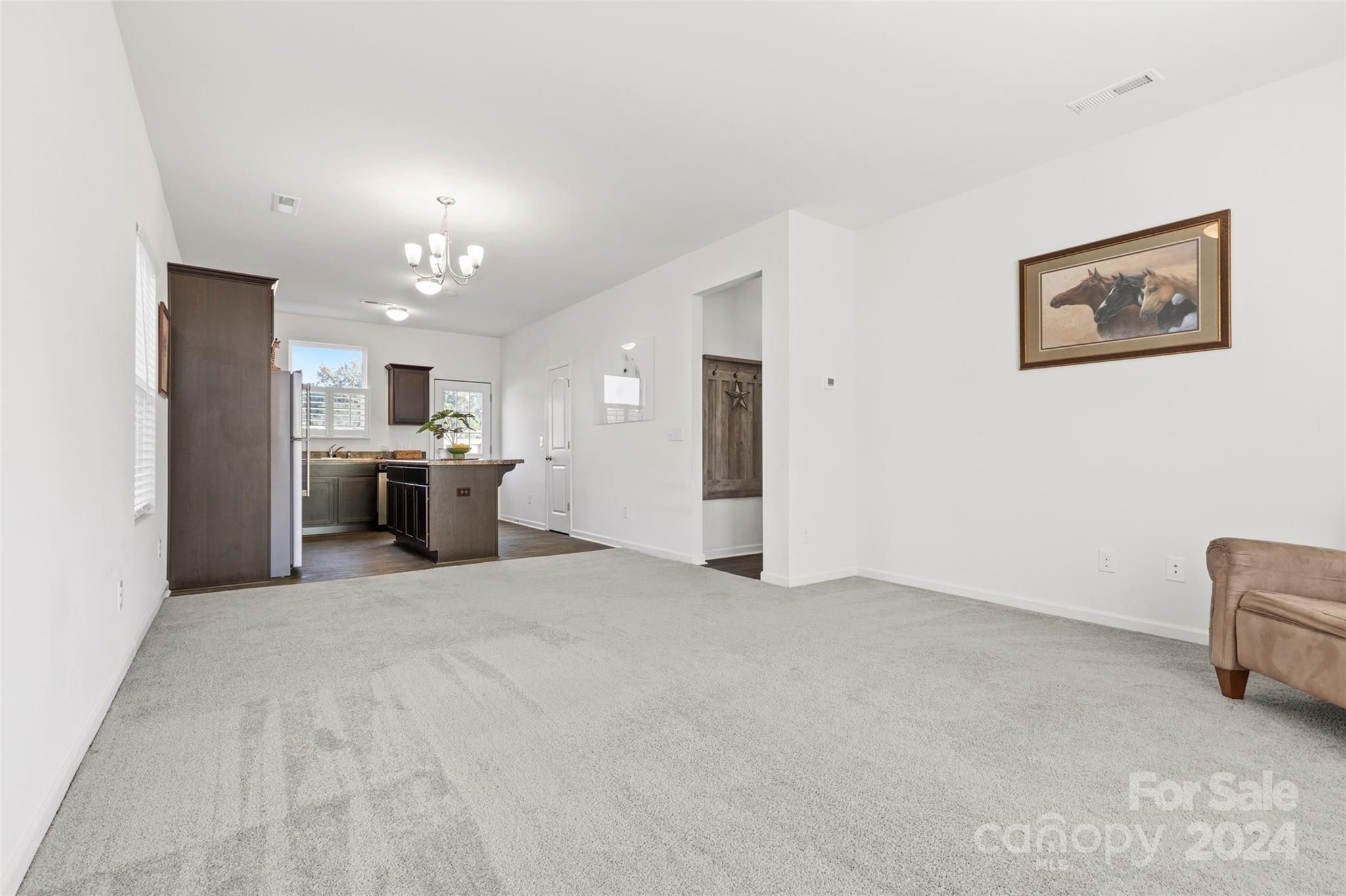 1015 Cherry Bark Place Landis, NC 28088 - Photo 9 of 24 a view of kitchen with refrigerator and windows
