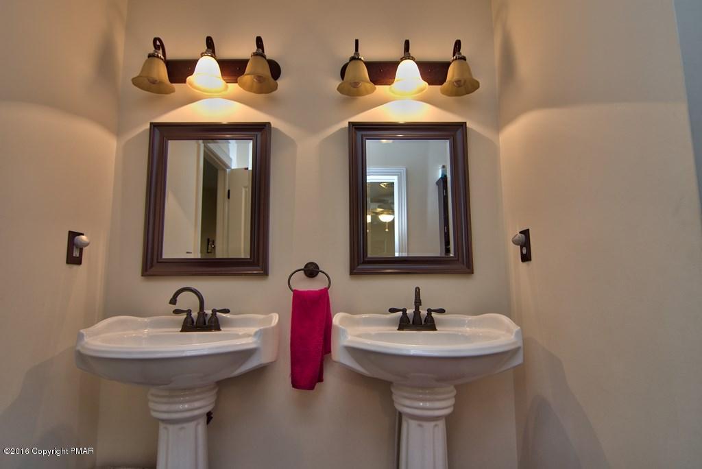 271 Williams Road Cresco, PA 18326 - Photo 24 of 46 a bathroom with a sink and a mirror