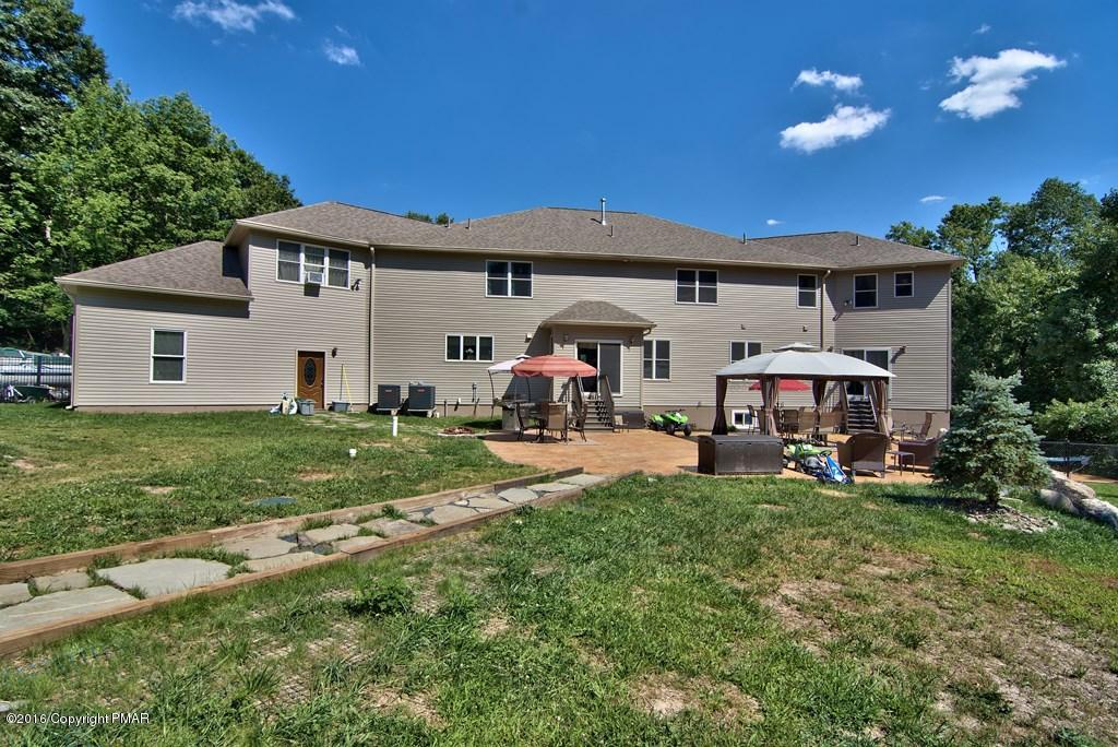 271 Williams Road Cresco, PA 18326 - Photo 32 of 46 a view of a house with a yard and sitting area