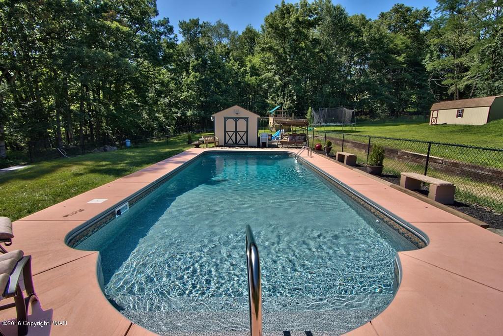 271 Williams Road Cresco, PA 18326 - Photo 35 of 46 a view of a swimming pool with a patio