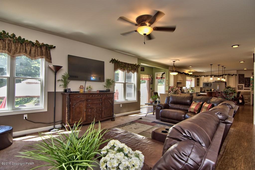 271 Williams Road Cresco, PA 18326 - Photo 7 of 46 a living room with furniture and a flat screen tv