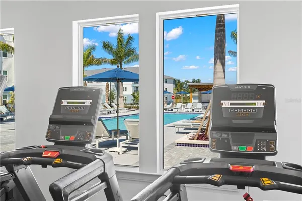 a view of a room with gym equipment
