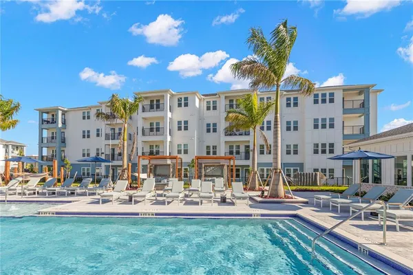 a view of a building with a swimming pool