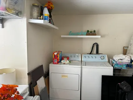 a utility room with dryer and washer