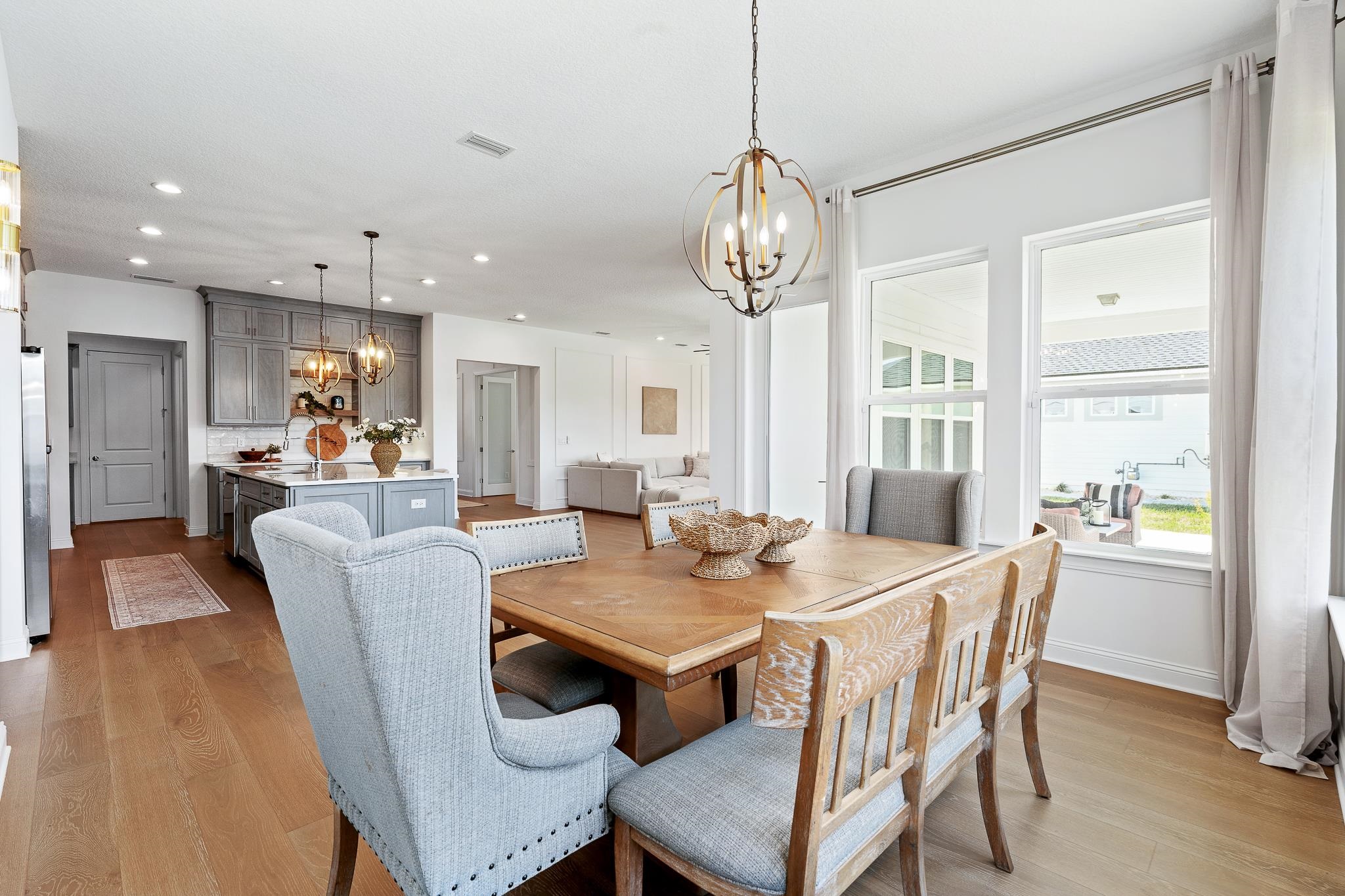 164 Tesoro Terrace St. Augustine, FL 32095 - Photo 15 of 98 a view of a dining room with furniture window and wooden floor