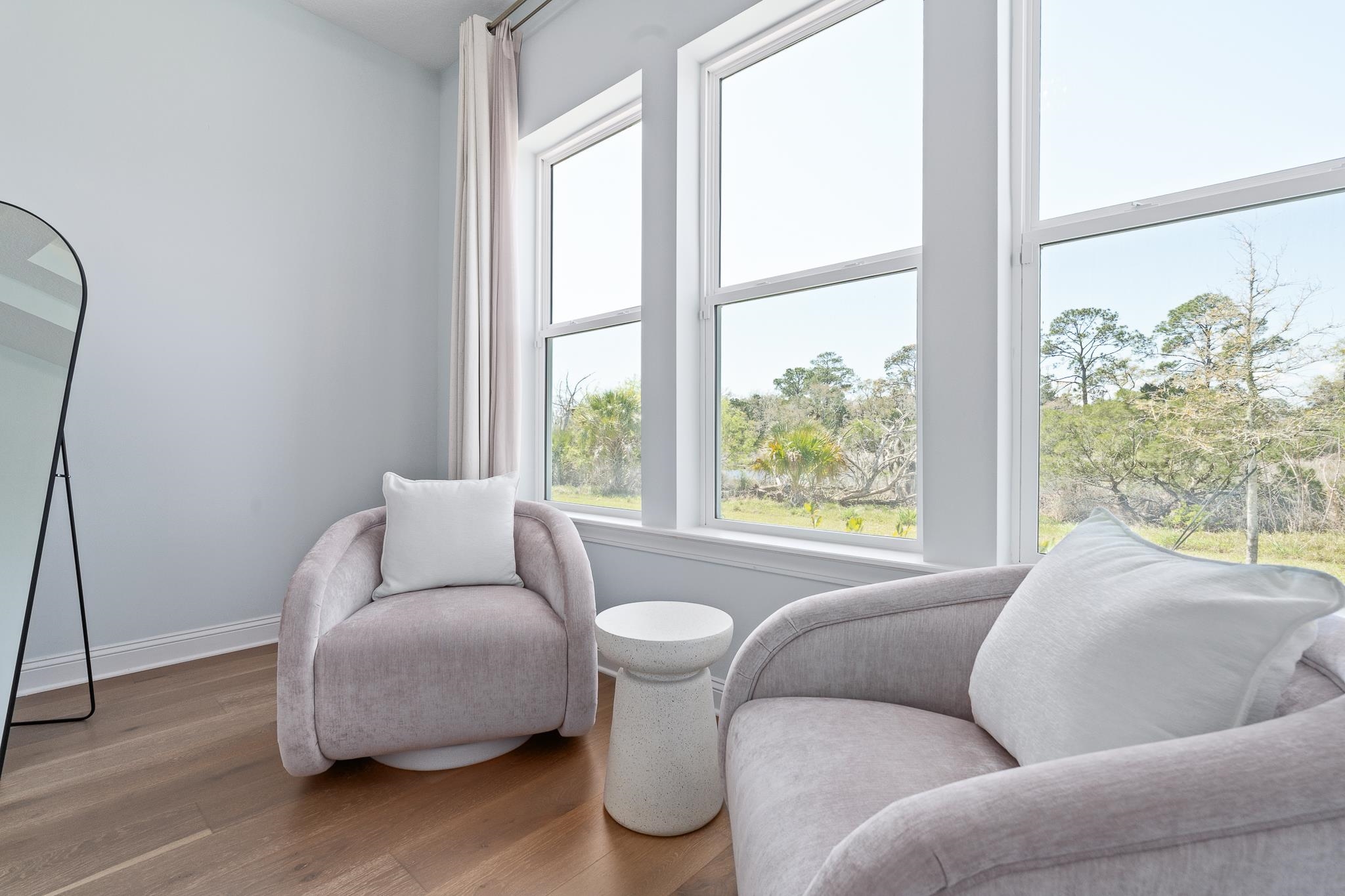 164 Tesoro Terrace St. Augustine, FL 32095 - Photo 29 of 98 a living room with furniture and a large window