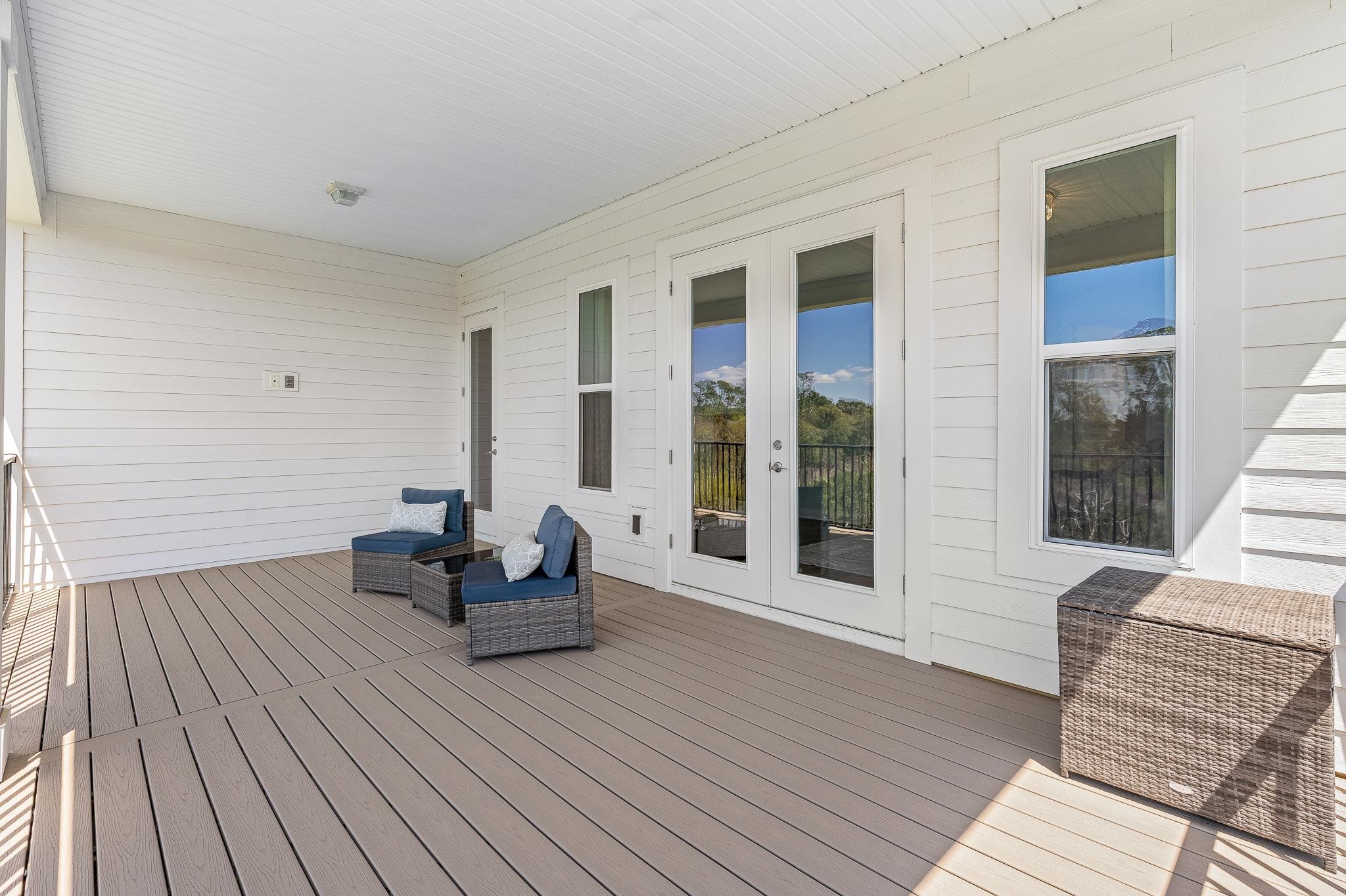 164 Tesoro Terrace St. Augustine, FL 32095 - Photo 48 of 98 a living room with furniture and large windows
