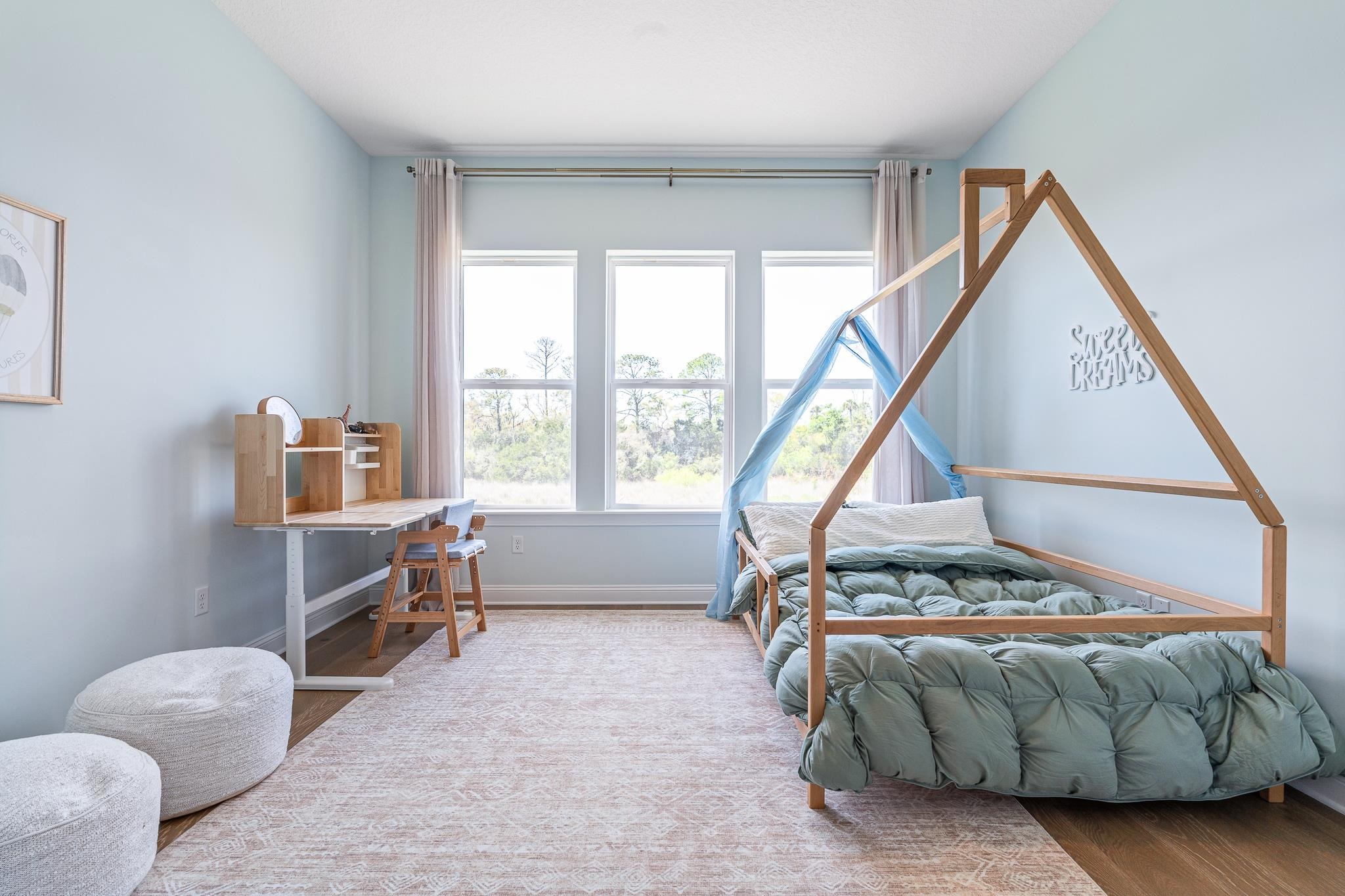 164 Tesoro Terrace St. Augustine, FL 32095 - Photo 50 of 98 a living room with furniture and a large window