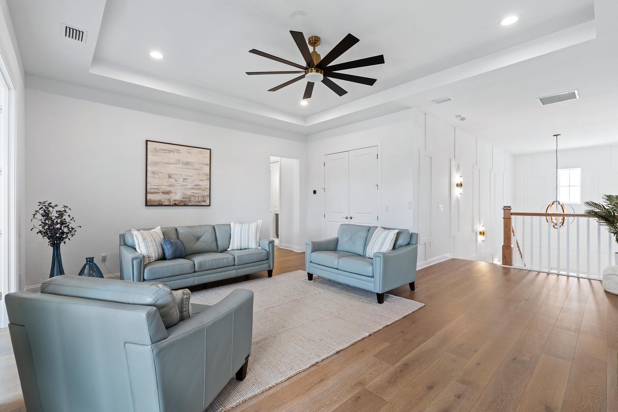 164 Tesoro Terrace St. Augustine, FL 32095 - Photo 57 of 98 a living room with furniture and a ceiling fan