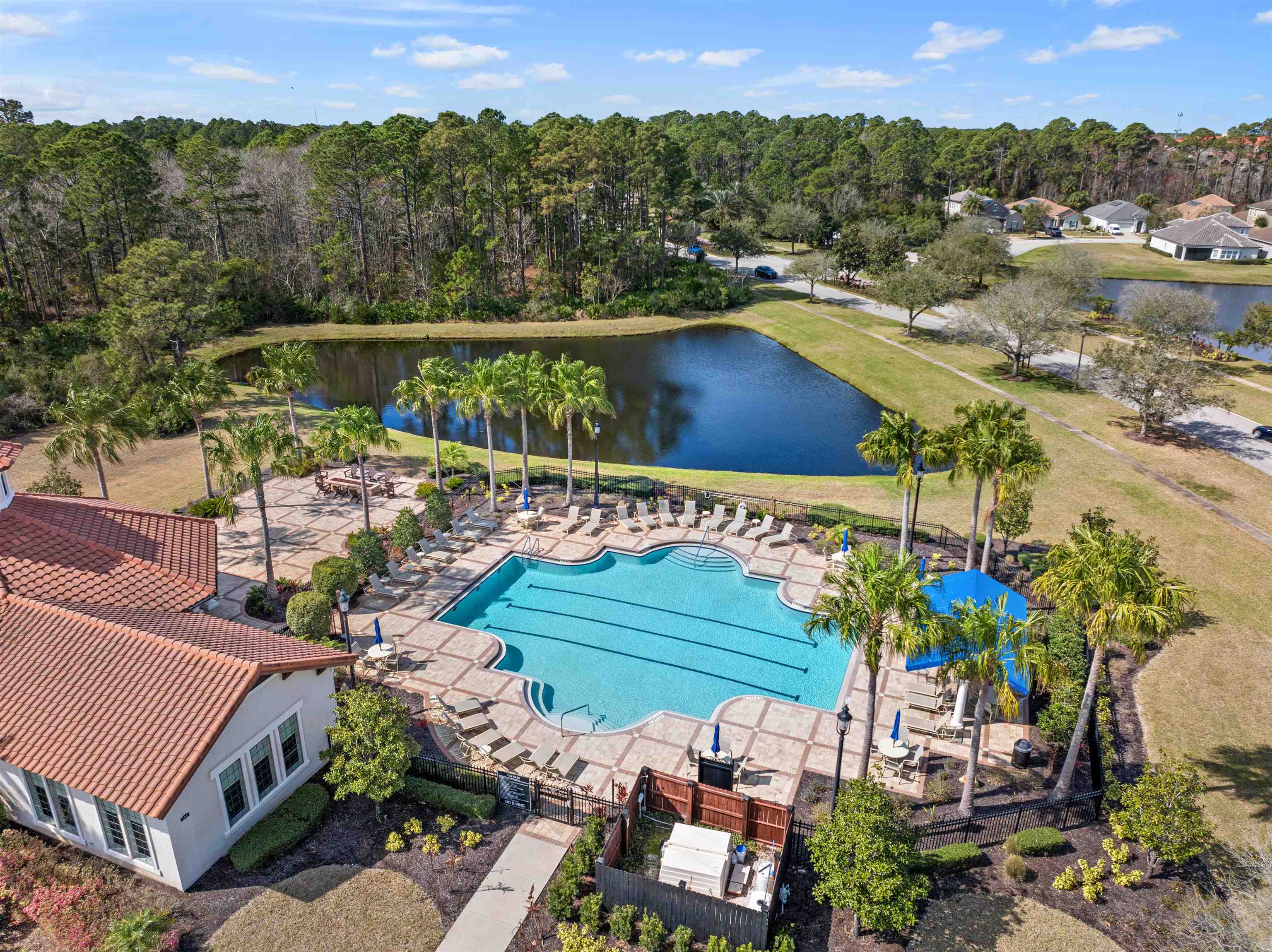 164 Tesoro Terrace St. Augustine, FL 32095 - Photo 83 of 98 an aerial view of a house with a garden and lake view