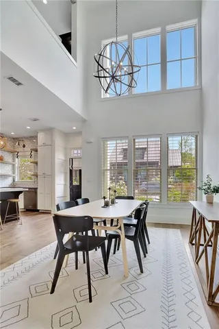 a view of a dining area with furniture window and outside view