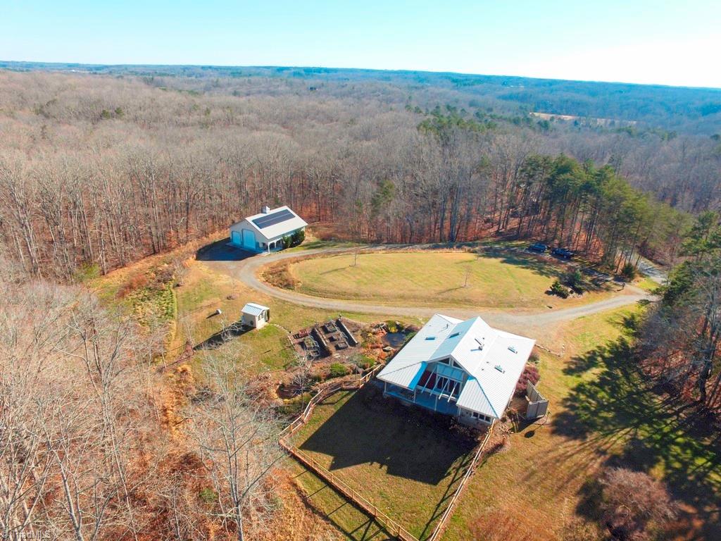 1045 West Old Phillips Road Pinnacle, NC 27043 - Photo 2 of 29 Beautifully set on 8.5 acres, surrounded by forest and creeks.