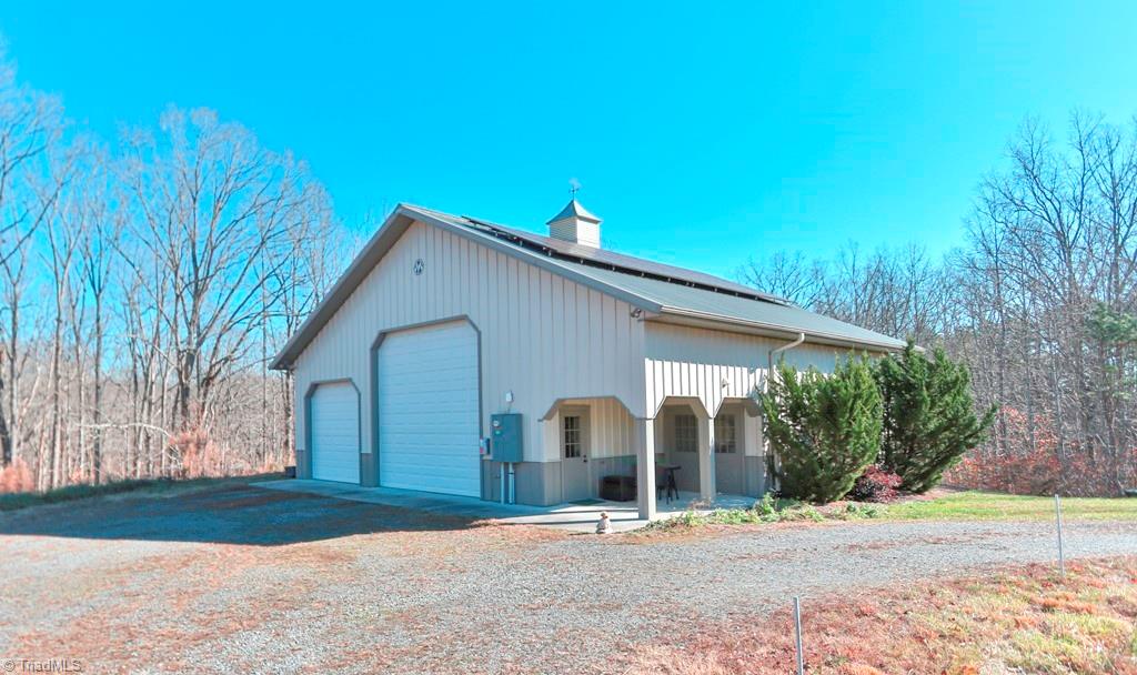 1045 West Old Phillips Road Pinnacle, NC 27043 - Photo 20 of 29 Barn or garage just doesn't seem an adequate description. This 42 x 42 Morton Barn has all the bells and whistles.