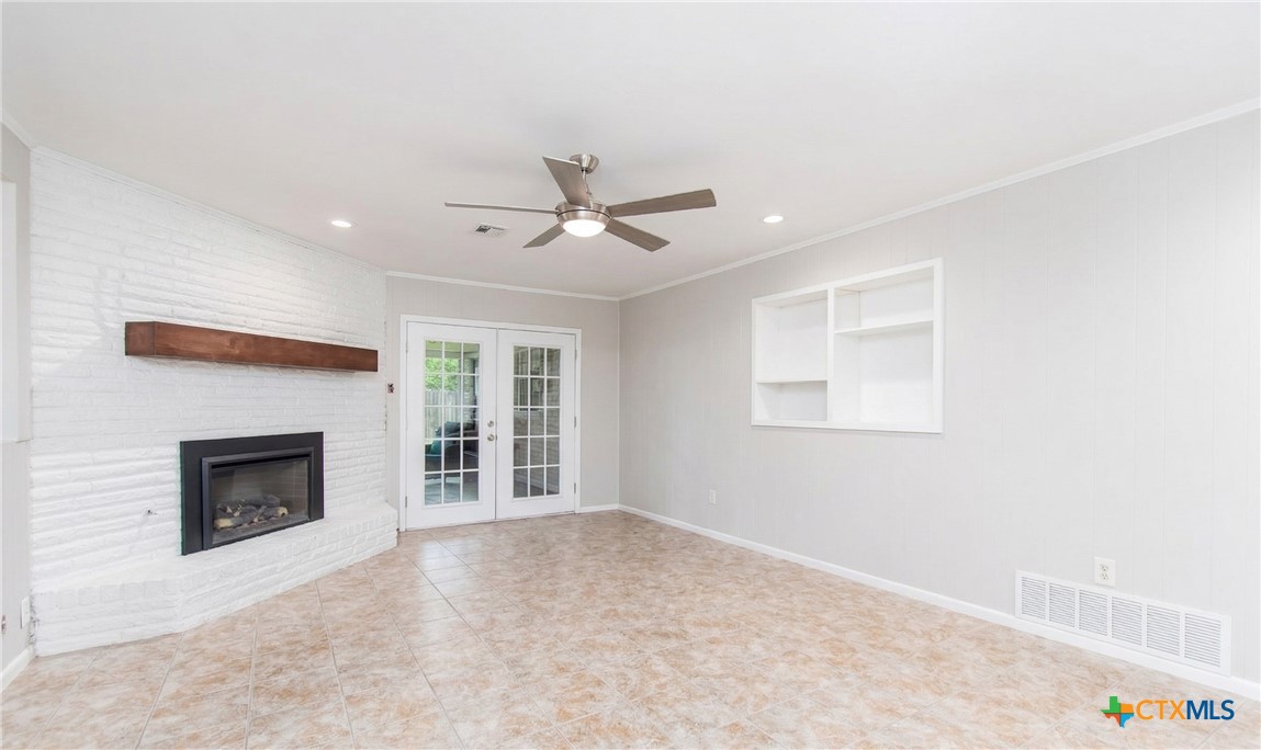 4512 Briar Cliff Road Temple, TX 76502 - Photo 8 of 20 Living room, with french doors leading to the enclosed patio