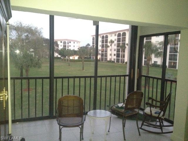 41 High Point Circle South, Unit 210 Naples, FL 34103 - Photo 1 of 4 Open and sunny lanai