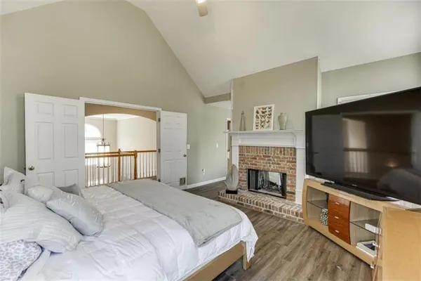 a bathroom with a sink a mirror and a shower