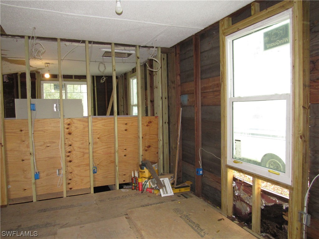 1140 River Road North Fort Myers, FL 33903 - Photo 11 of 17 a view of a porch with a door