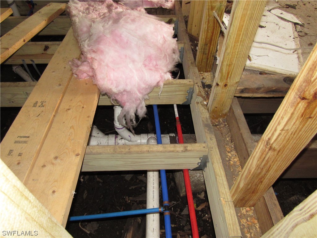1140 River Road North Fort Myers, FL 33903 - Photo 12 of 17 a view of living room with furniture and a fireplace