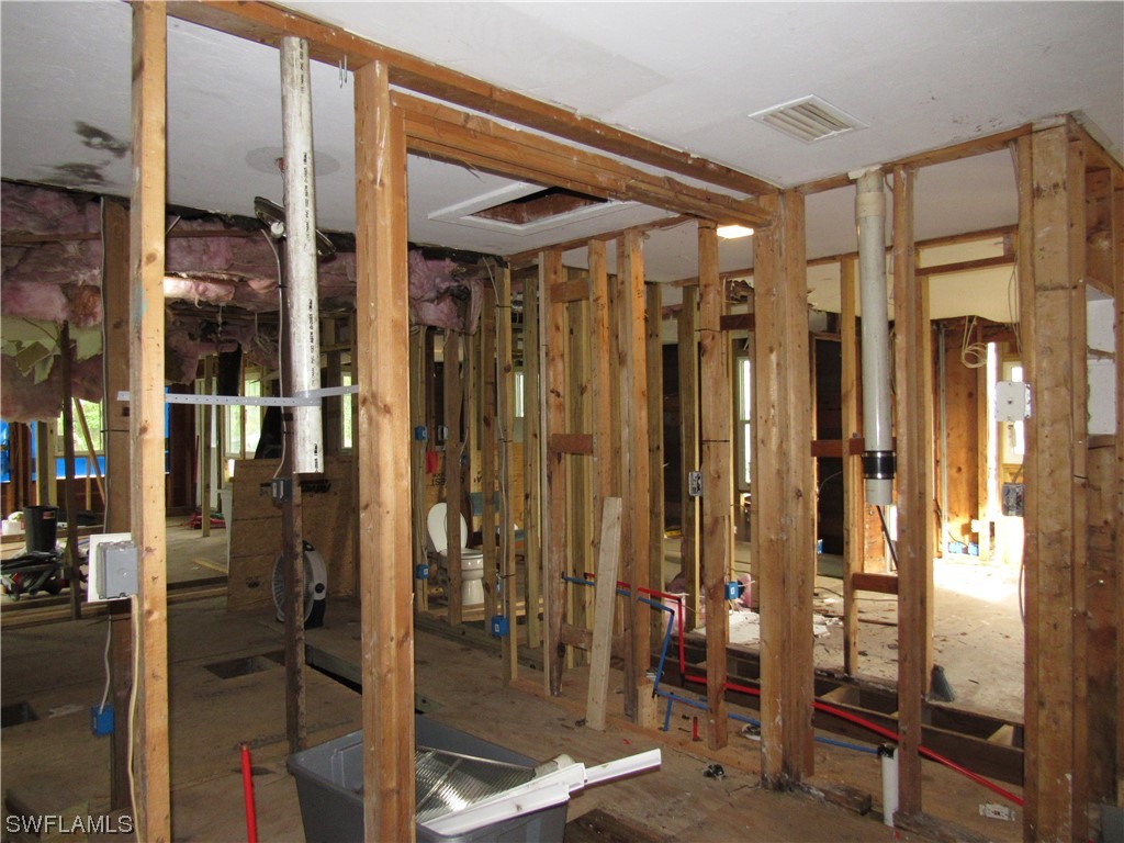 1140 River Road North Fort Myers, FL 33903 - Photo 8 of 17 a bathroom with a glass shower door