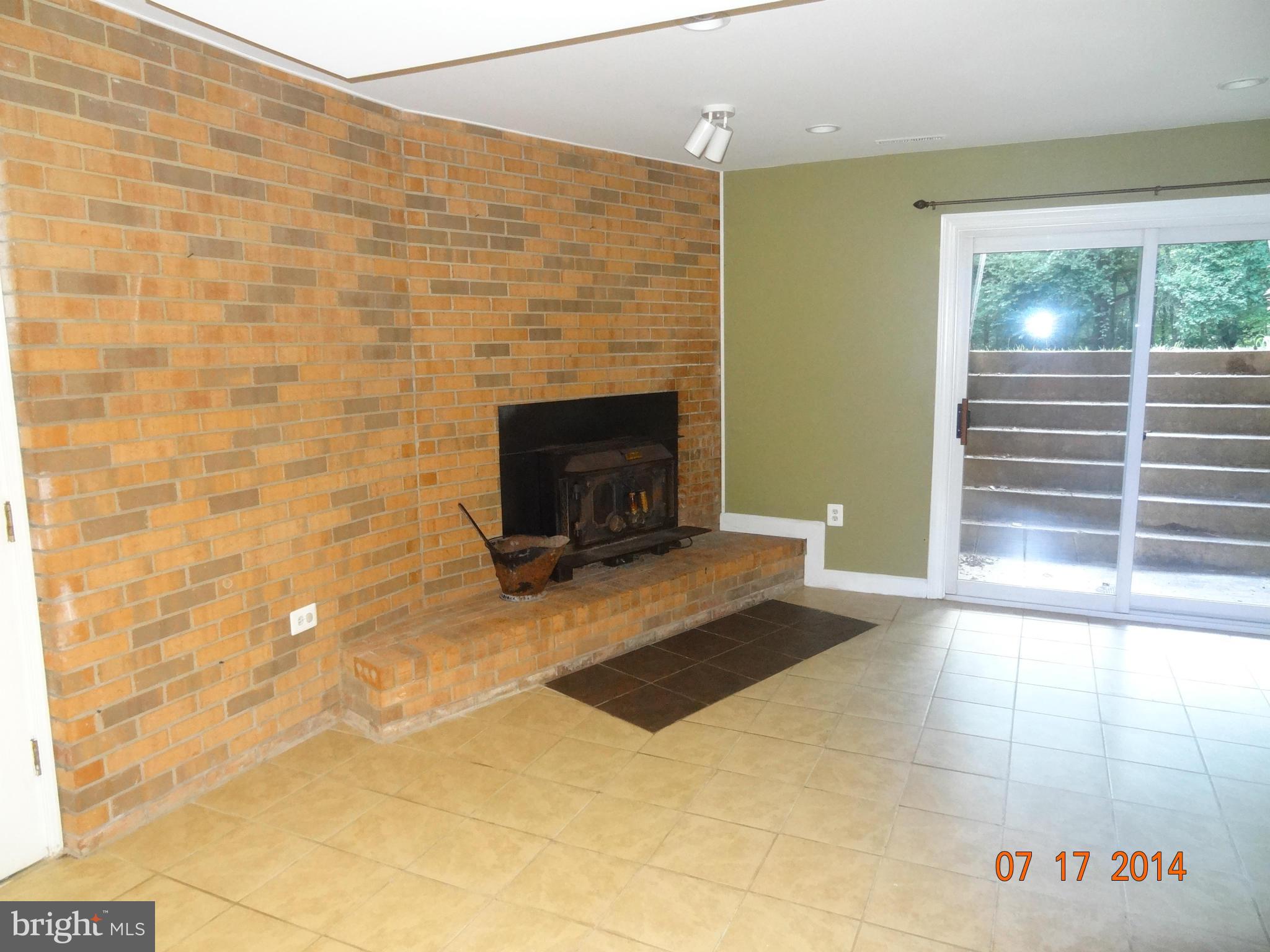 6585 Davis Ford Road Manassas, VA 20111 - Photo 4 of 30 Brick Wood Burning Fireplace