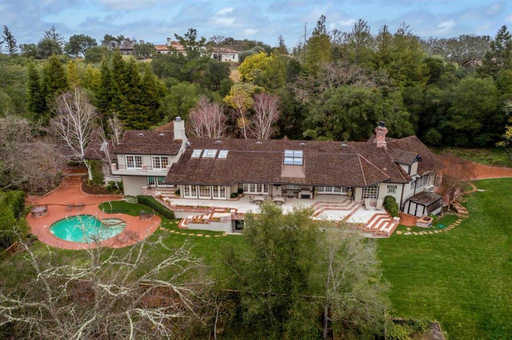 165 Farm Road Woodside, CA 94062 - Photo 1 of 29 an aerial view of a house with a garden