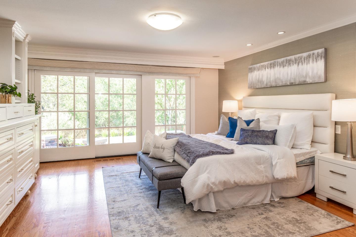 165 Farm Road Woodside, CA 94062 - Photo 12 of 29 a spacious bedroom with a bed and a large window