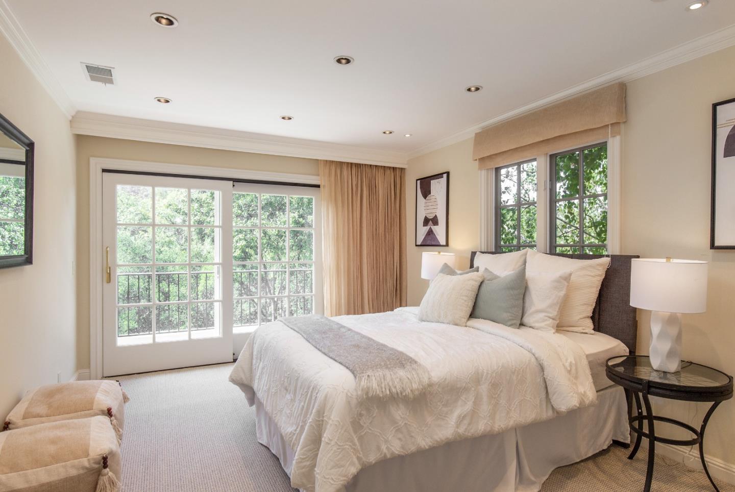 165 Farm Road Woodside, CA 94062 - Photo 16 of 29 a bedroom with a bed and a large window