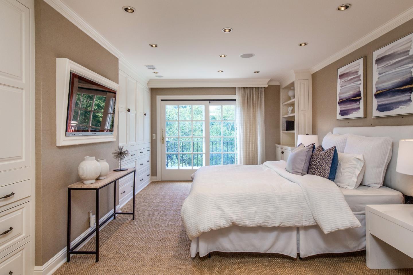 165 Farm Road Woodside, CA 94062 - Photo 19 of 29 a large bedroom with a bed and window