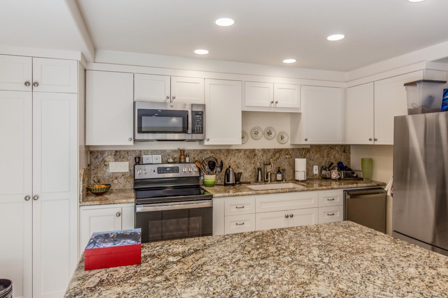 165 Farm Road Woodside, CA 94062 - Photo 27 of 29 a kitchen with stainless steel appliances granite countertop a stove a sink and a refrigerator